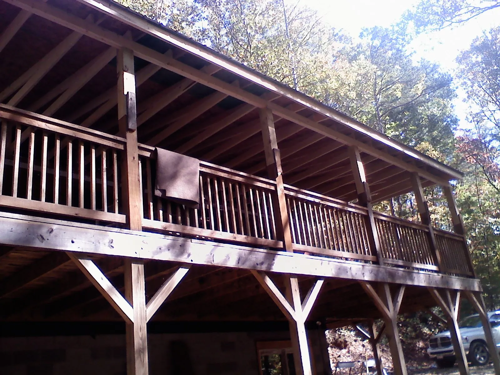 Timber framing under a new elevated porch and deck — Roof Leak Repair in West Salem by Roofing Brothers